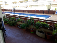 Estartit - Ground floor apartment, with large terrace and communal pool, 500 meters from the beach.
